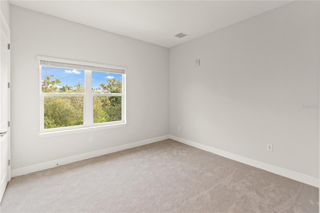 7611 34th Ave W Unit 301, Bradenton, FL 34209 - carpeted spare room featuring baseboards