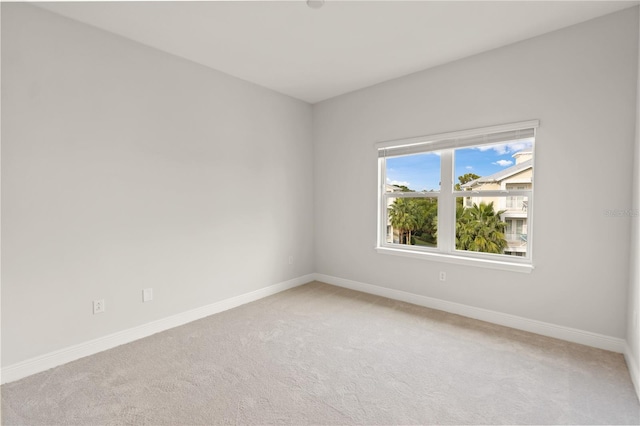 7611 34th Ave W Unit 301, Bradenton, FL 34209 - spare room featuring light carpet