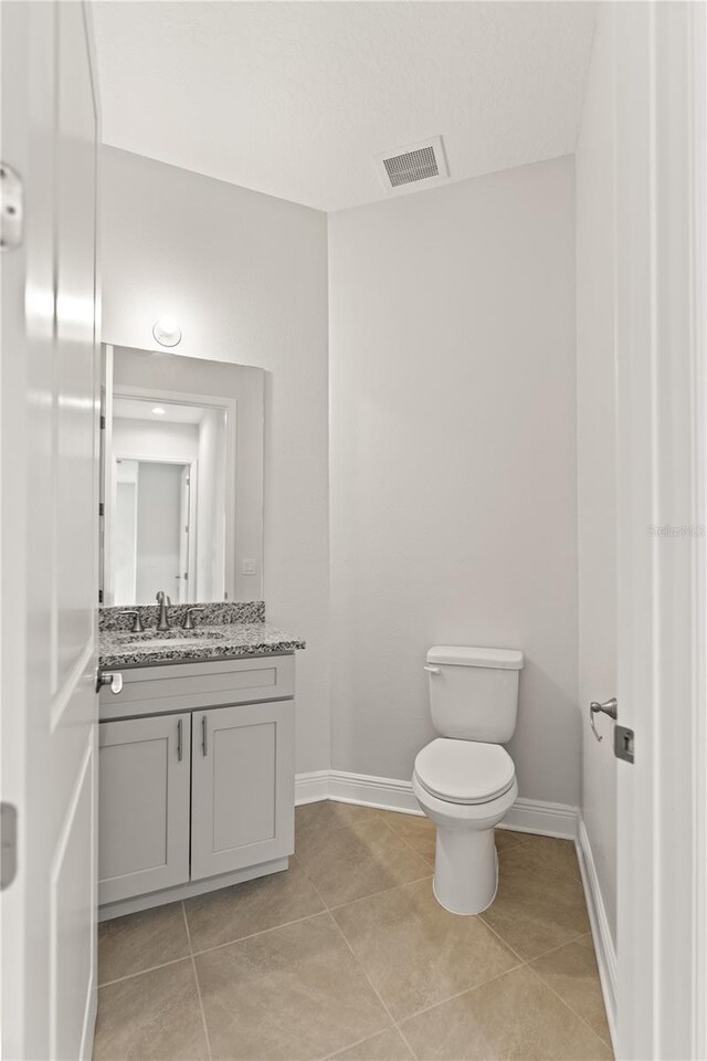 7611 34th Ave W Unit 301, Bradenton, FL 34209 - bathroom featuring vanity and tile patterned floors