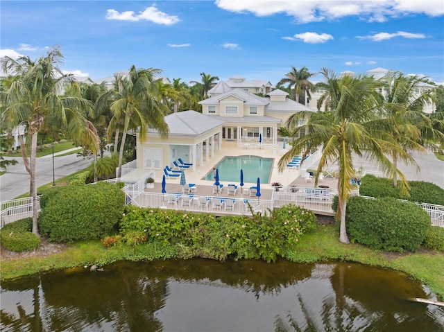 7611 34th Ave W Unit 301, Bradenton, FL 34209 - back of house with a water view and a patio area