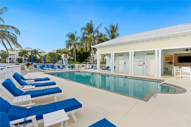 7611 34th Ave W Unit 301, Bradenton, FL 34209 - community pool with a patio and ceiling fan