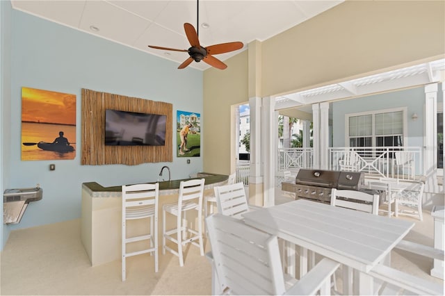 7611 34th Ave W Unit 301, Bradenton, FL 34209 - view of patio with ceiling fan, grilling area, and a pergola