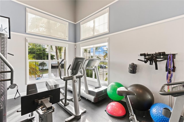 7611 34th Ave W Unit 301, Bradenton, FL 34209 - workout area featuring healthy amount of natural light and a towering ceiling