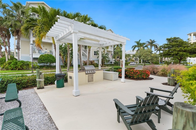 7611 34th Ave W Unit 301, Bradenton, FL 34209 - view of patio / terrace with area for grilling and a pergola
