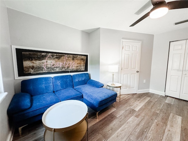 25640 State Road 70 E, Myakka City, FL 34251 - living room featuring wood finished floors and ceiling fan