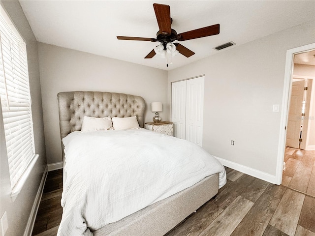 25640 State Road 70 E, Myakka City, FL 34251 - bedroom featuring wood finished floors, a closet, and a ceiling fan