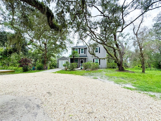 25640 State Road 70 E, Myakka City, FL 34251 - view of front of property featuring driveway and a garage