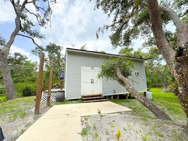 25640 State Road 70 E, Myakka City, FL 34251 - rear view of house featuring entry steps