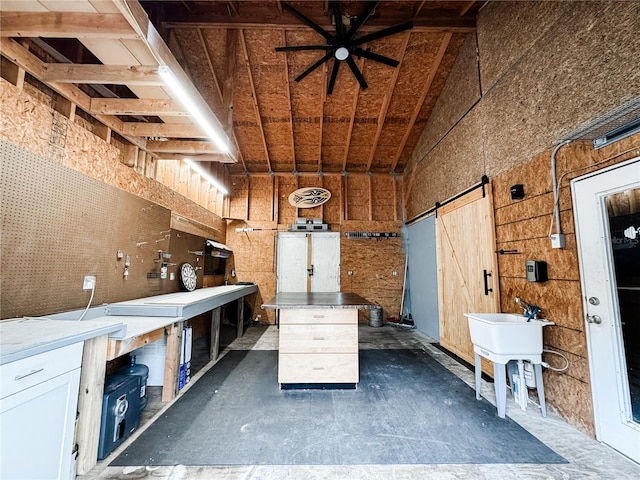 25640 State Road 70 E, Myakka City, FL 34251 - misc room featuring a workshop area, a barn door, and ceiling fan