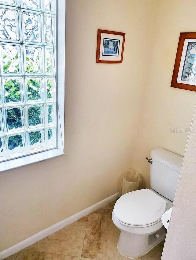 8703 53rd Ave W, Bradenton, FL 34210 - bathroom with toilet and tile patterned floors