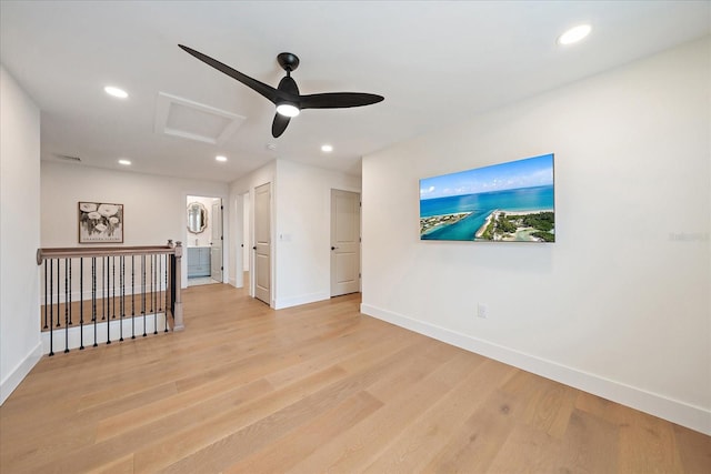 1876 Livingstone St, Sarasota, FL 34231 - empty room featuring attic access, light wood-style floors, and recessed lighting