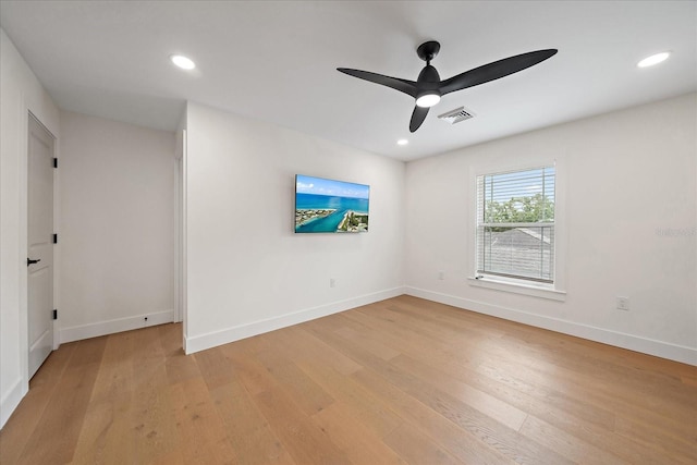 1876 Livingstone St, Sarasota, FL 34231 - empty room featuring light wood-style flooring, a ceiling fan, and recessed lighting