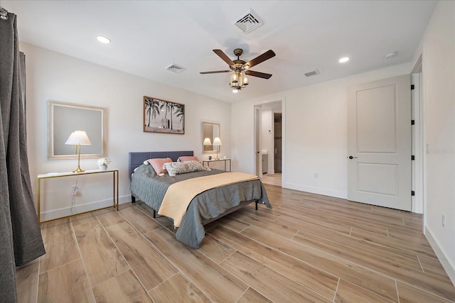1876 Livingstone St, Sarasota, FL 34231 - bedroom featuring light wood-style floors, recessed lighting, a ceiling fan, and ensuite bath