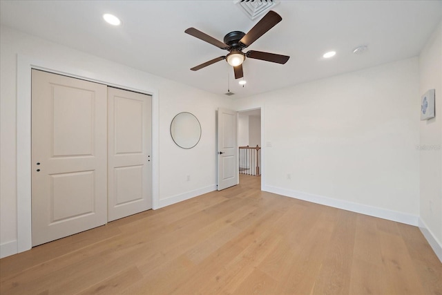 1876 Livingstone St, Sarasota, FL 34231 - unfurnished bedroom with light wood-style flooring, recessed lighting, a closet, and ceiling fan