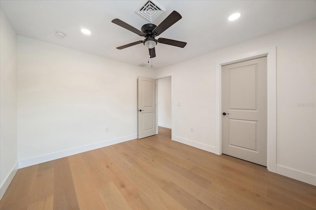 1876 Livingstone St, Sarasota, FL 34231 - unfurnished bedroom featuring light wood-style floors, recessed lighting, and a ceiling fan