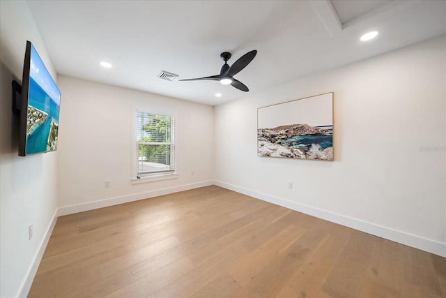 1876 Livingstone St, Sarasota, FL 34231 - spare room with wood finished floors, recessed lighting, ceiling fan, and attic access