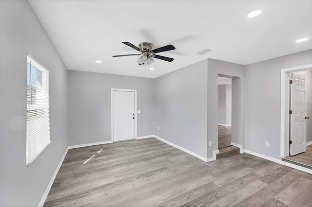 3327 King Blvd, Sarasota, FL 34234 - unfurnished room with a ceiling fan, wood finished floors, and recessed lighting