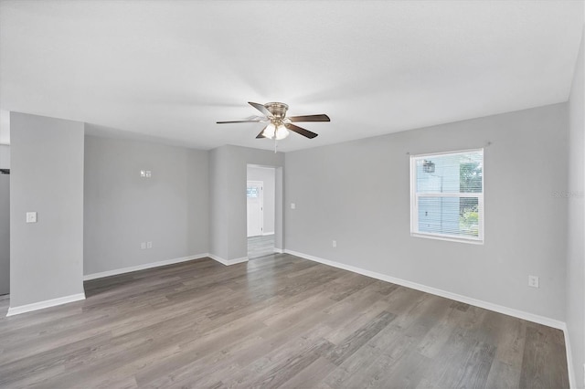 3327 King Blvd, Sarasota, FL 34234 - spare room featuring ceiling fan and wood finished floors