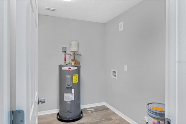3327 King Blvd, Sarasota, FL 34234 - utility room with water heater