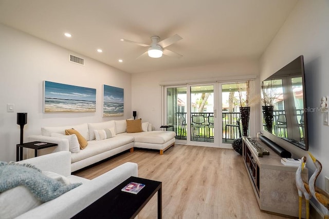 1801 Gulf Dr N Unit 276, Bradenton Beach, FL 34217 - living area featuring a ceiling fan, light wood-type flooring, healthy amount of natural light, and recessed lighting