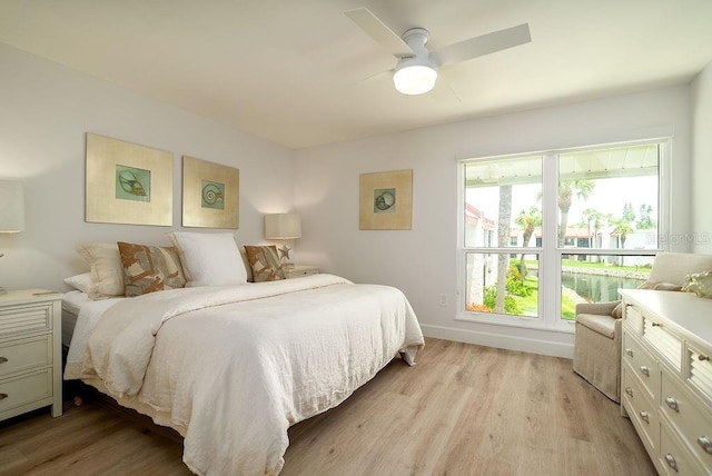 1801 Gulf Dr N Unit 276, Bradenton Beach, FL 34217 - bedroom featuring light wood-style floors and ceiling fan
