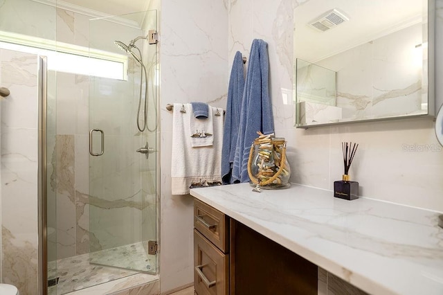 1801 Gulf Dr N Unit 276, Bradenton Beach, FL 34217 - bathroom with vanity, a marble finish shower, and ornamental molding
