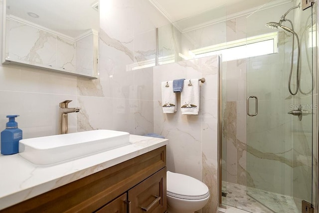 1801 Gulf Dr N Unit 276, Bradenton Beach, FL 34217 - bathroom with tile walls, crown molding, a marble finish shower, and vanity