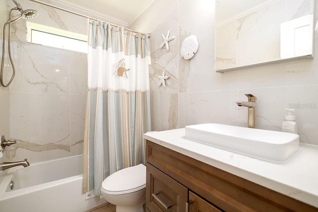1801 Gulf Dr N Unit 276, Bradenton Beach, FL 34217 - full bath with tile walls, vanity, crown molding, and shower / bath combo with shower curtain