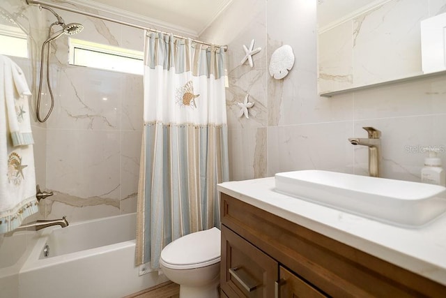 1801 Gulf Dr N Unit 276, Bradenton Beach, FL 34217 - full bath featuring tile walls, vanity, shower / bathtub combination with curtain, and ornamental molding