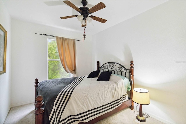 2303 28th Ave E, Palmetto, FL 34221 - carpeted bedroom with baseboards and a ceiling fan