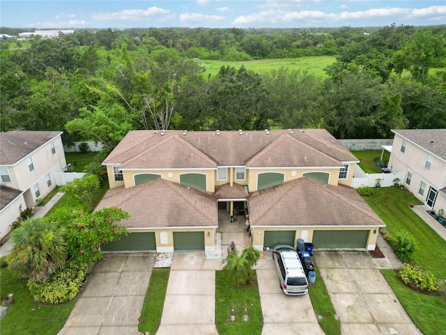 2303 28th Ave E, Palmetto, FL 34221 - aerial view of property and surrounding area featuring a heavily wooded area