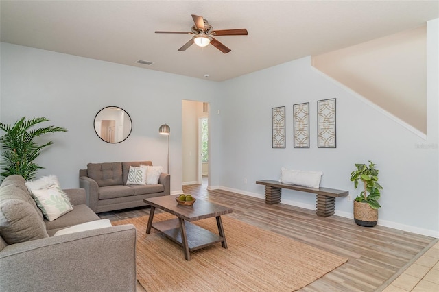 5405 98th Ave E, Parrish, FL 34219 - living area with ceiling fan and light wood-style floors
