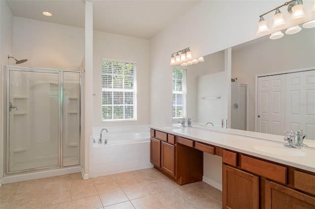 5405 98th Ave E, Parrish, FL 34219 - full bath with a stall shower, a bath, double vanity, and tile patterned floors