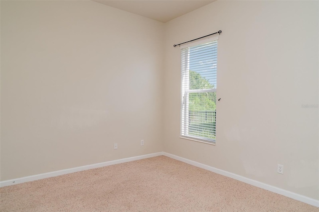 5405 98th Ave E, Parrish, FL 34219 - spare room featuring baseboards and carpet flooring