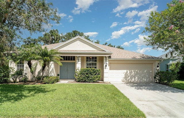 5405 98th Ave E, Parrish, FL 34219 - single story home featuring stucco siding, a front lawn, driveway, and an attached garage