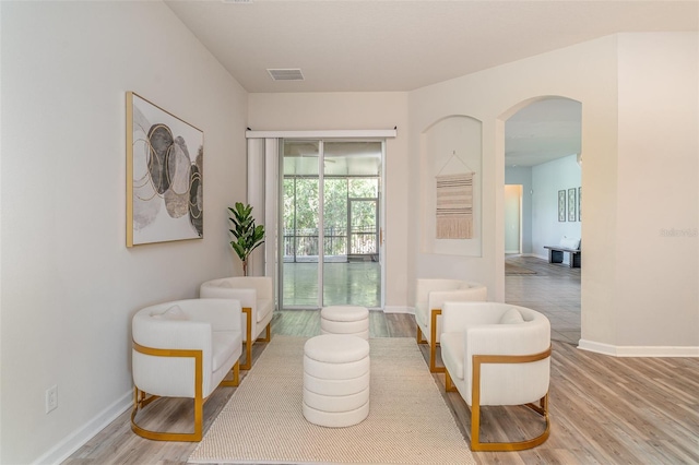 5405 98th Ave E, Parrish, FL 34219 - sitting room featuring wood finished floors and arched walkways