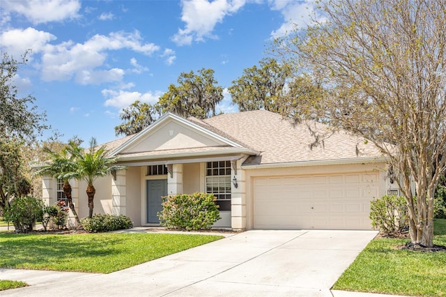 5405 98th Ave E, Parrish, FL 34219 - view of front of house with stucco siding, an attached garage, concrete driveway, a front lawn, and a shingled roof