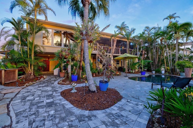 701 Marbury Ln, Longboat Key, FL 34228 - surrounding community featuring a patio area and a swimming pool