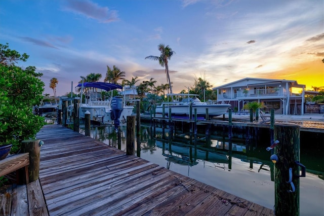 701 Marbury Ln, Longboat Key, FL 34228 - dock featuring boat lift and a water view