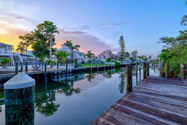 701 Marbury Ln, Longboat Key, FL 34228 - dock with a water view and a residential view