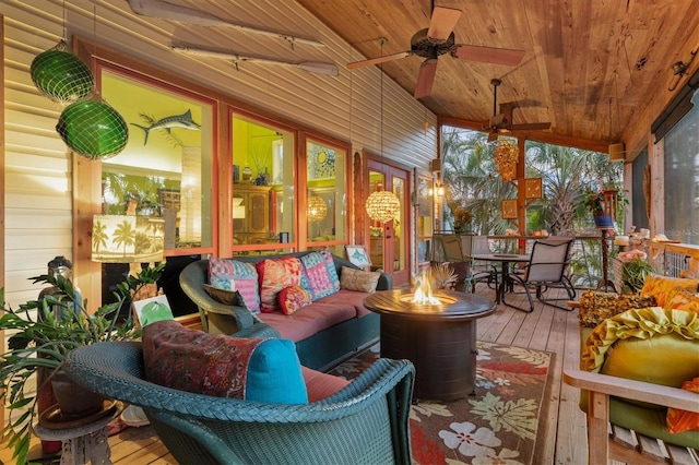 701 Marbury Ln, Longboat Key, FL 34228 - sunroom featuring wood ceiling, wood-type flooring, a wooden deck, and vaulted ceiling