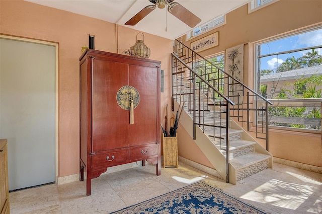 701 Marbury Ln, Longboat Key, FL 34228 - staircase with baseboards and a ceiling fan
