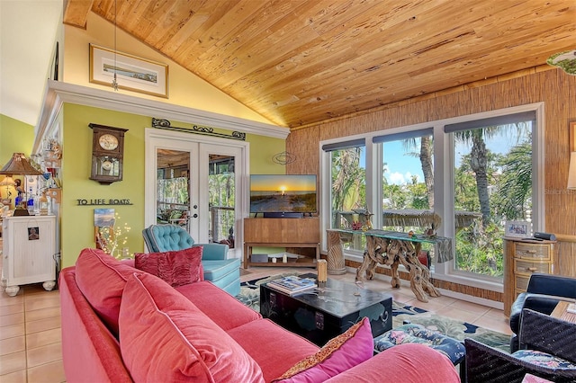 701 Marbury Ln, Longboat Key, FL 34228 - living area featuring vaulted ceiling, tile patterned flooring, french doors, wooden ceiling, and plenty of natural light