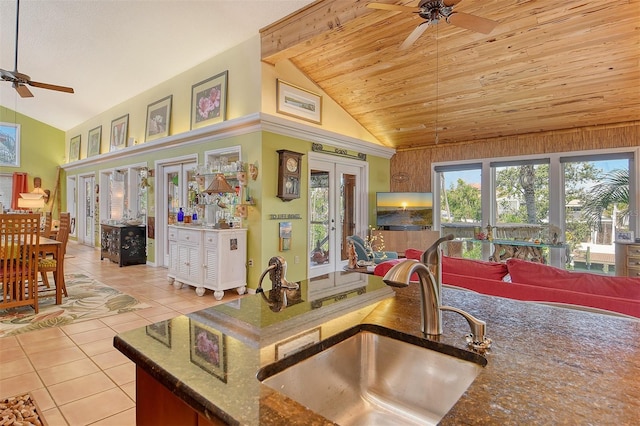 701 Marbury Ln, Longboat Key, FL 34228 - kitchen featuring a ceiling fan, french doors, high vaulted ceiling, tile patterned floors, and wooden ceiling