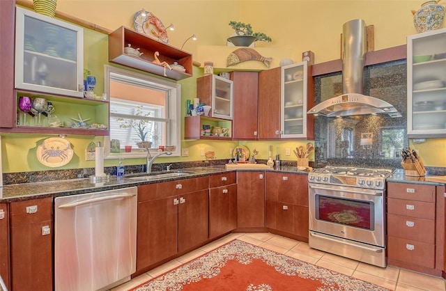 701 Marbury Ln, Longboat Key, FL 34228 - kitchen with wall chimney range hood, stainless steel appliances, light tile patterned flooring, open shelves, and dark stone countertops