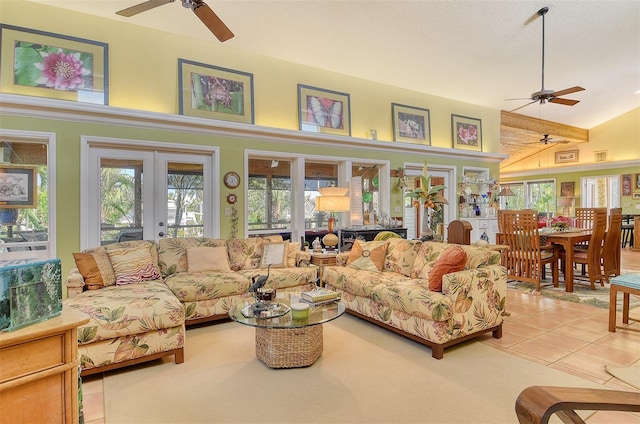 701 Marbury Ln, Longboat Key, FL 34228 - living room with ceiling fan, french doors, lofted ceiling, and light tile patterned flooring