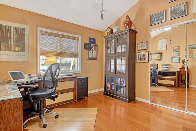 701 Marbury Ln, Longboat Key, FL 34228 - office space with light wood-type flooring and a textured ceiling