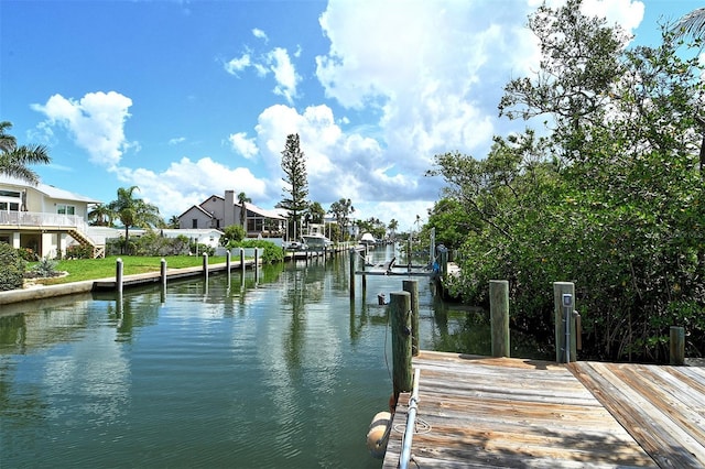701 Marbury Ln, Longboat Key, FL 34228 - dock with a water view and a residential view
