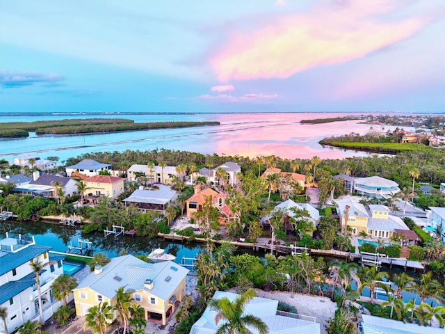 701 Marbury Ln, Longboat Key, FL 34228 - aerial perspective of suburban area featuring a large body of water