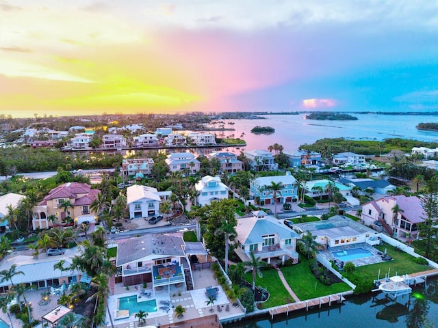 701 Marbury Ln, Longboat Key, FL 34228 - aerial view at dusk of a water view and a residential view